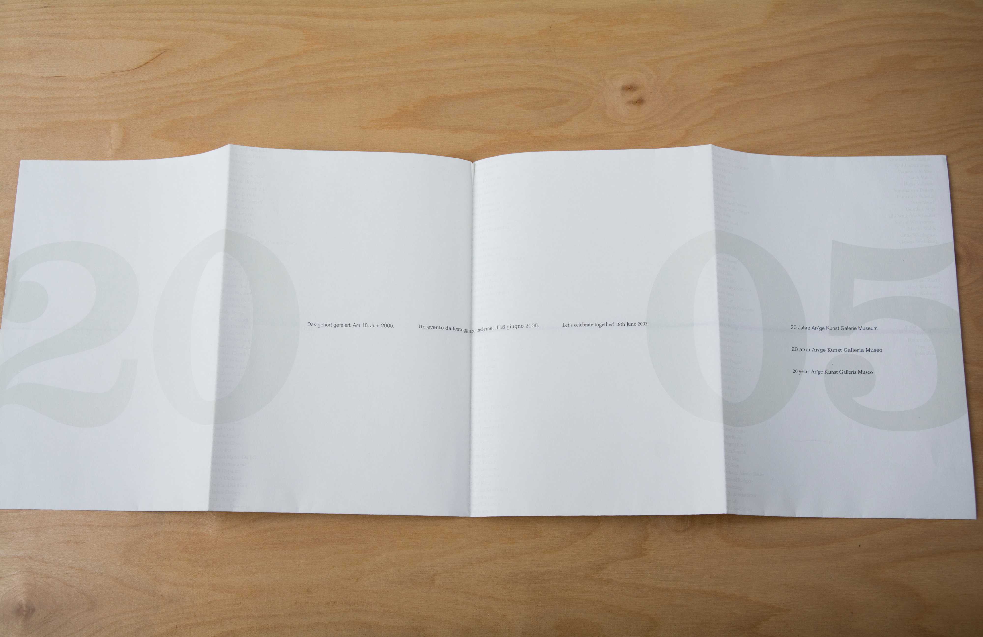Half-unfolded mailing. The year in large font size and some small text is visible.