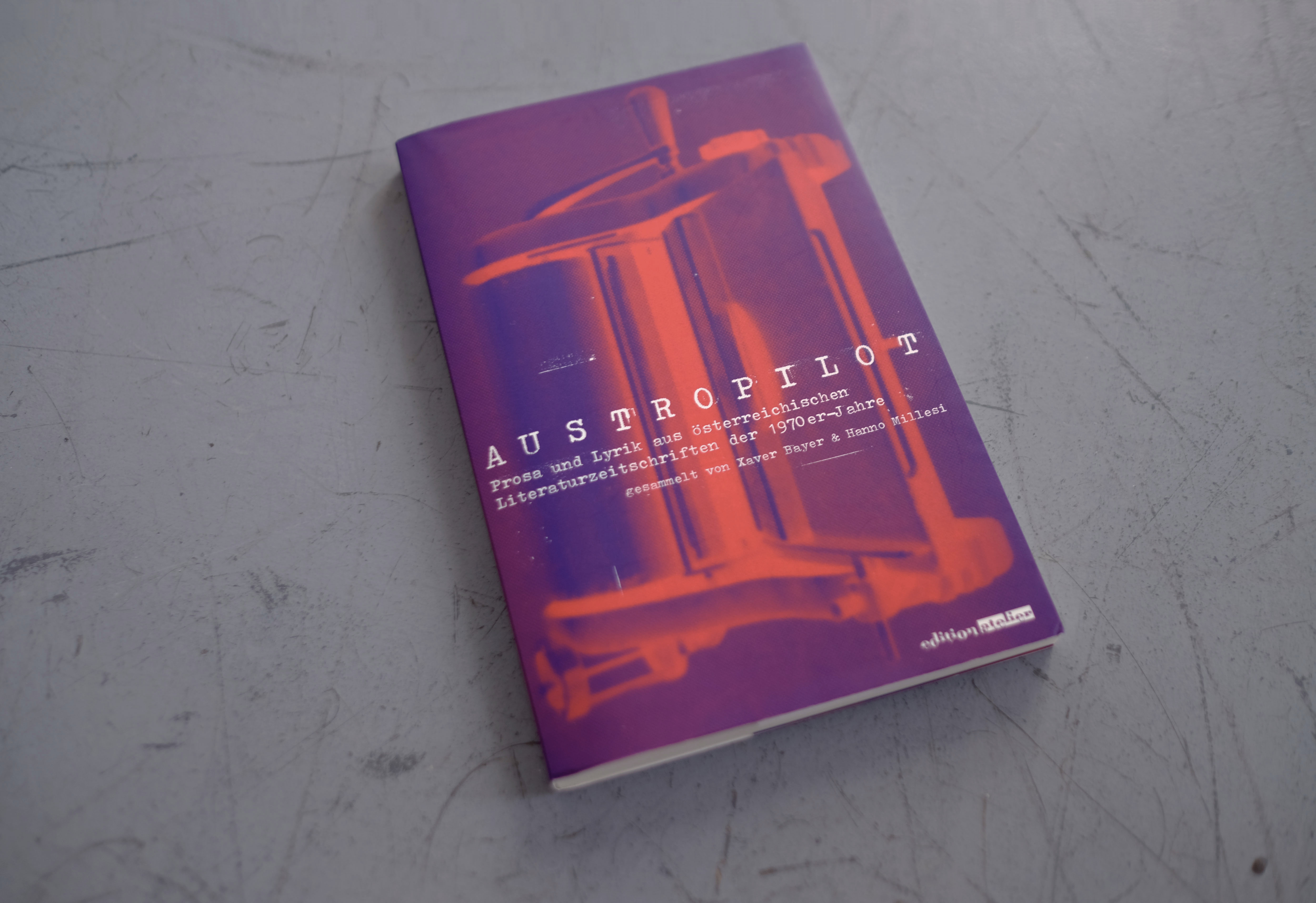 A book-cover. Two-tone image over the whole cover with title and subtitle overlayed in small typewriter text