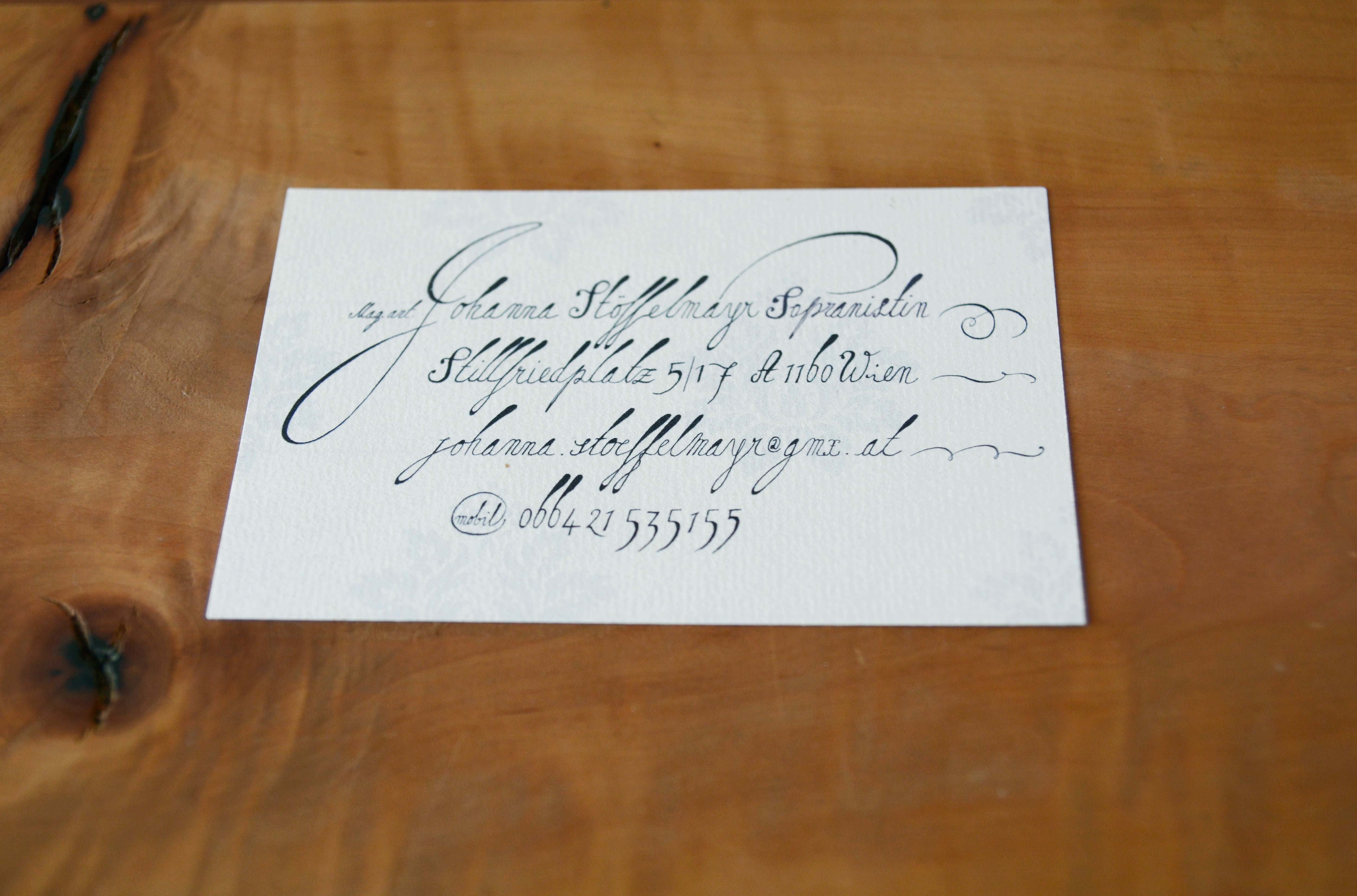 Business card classical musician. Text in handwritten font.