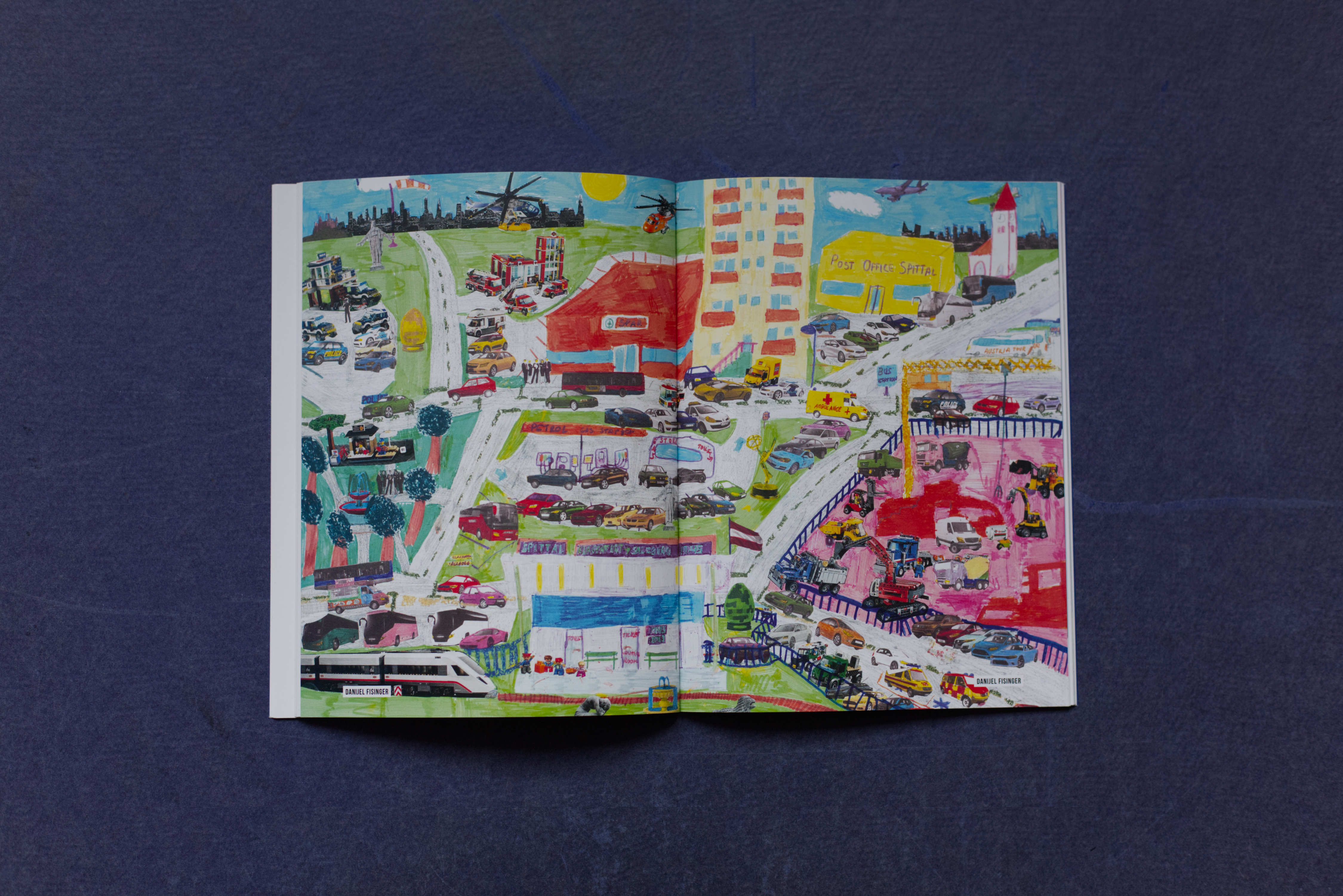 Double page. Illustration of city over 2 pages. Collage of drawing and cutted photos.