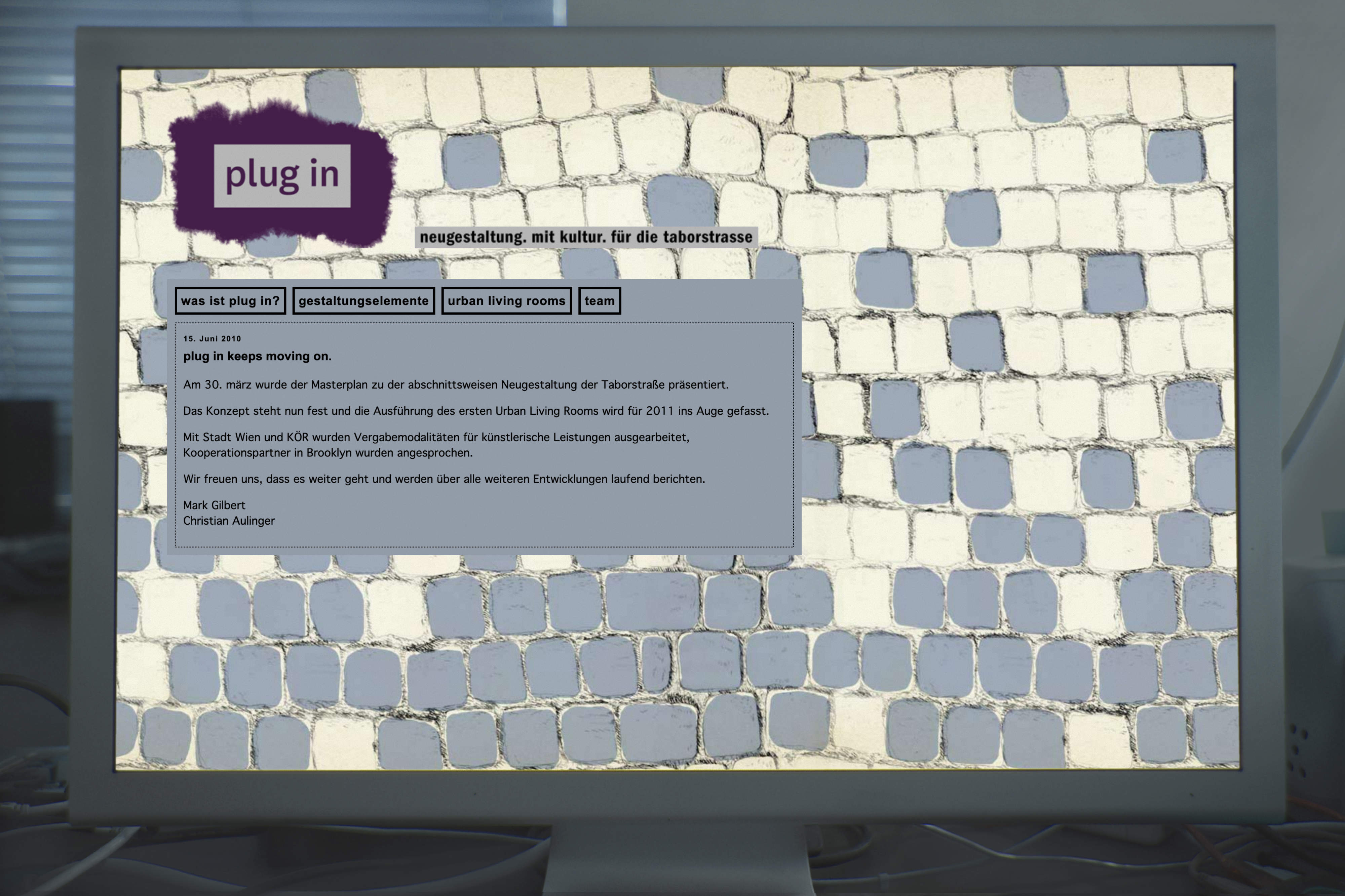 Desktop monitor with screenshot of website.