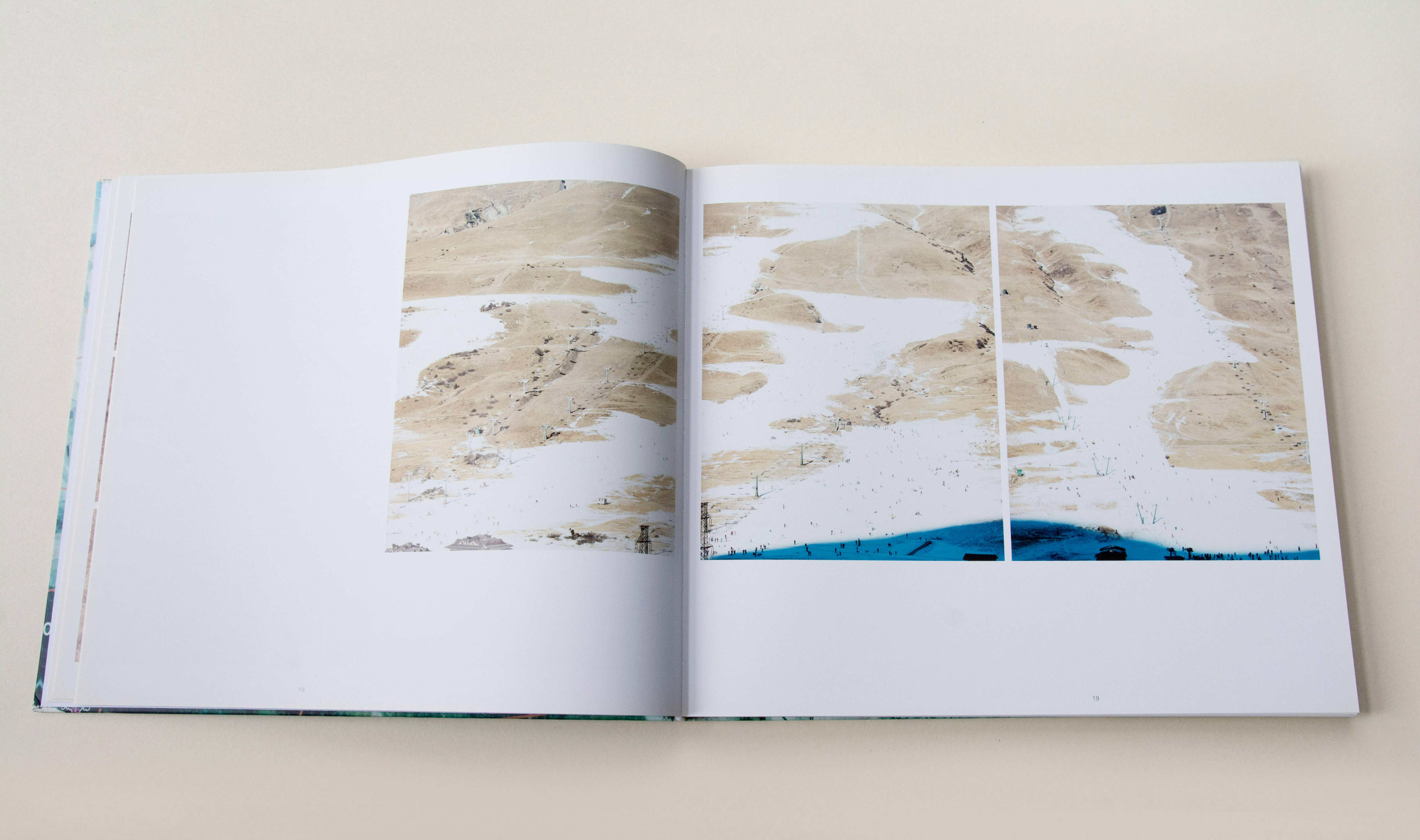 Double page. Left 1 and right 2 same sized photos. Far distance shots. Not fully snow-covered ski slopes.