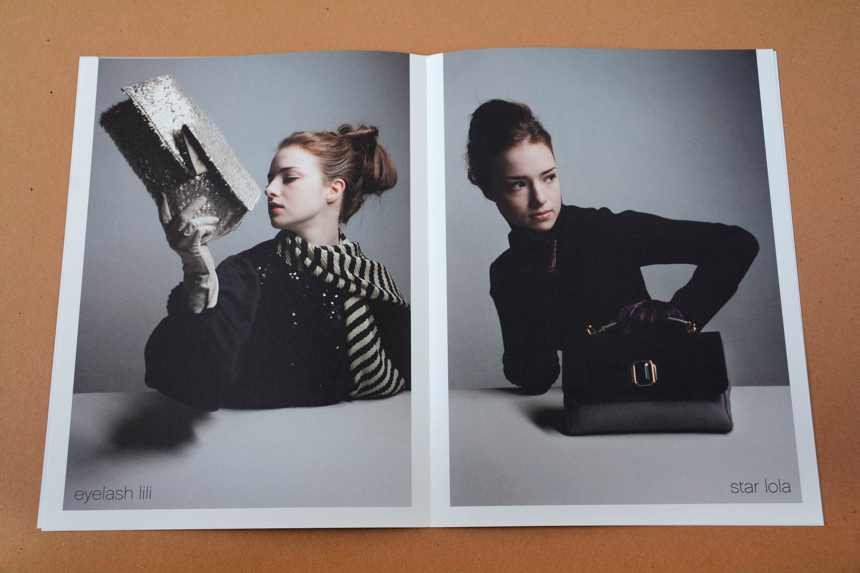 Double page. Full-page photos with partly white space around. Woman at a white table holding handbags in front of neutral background. Thin grotesque font overlayed at bottom.