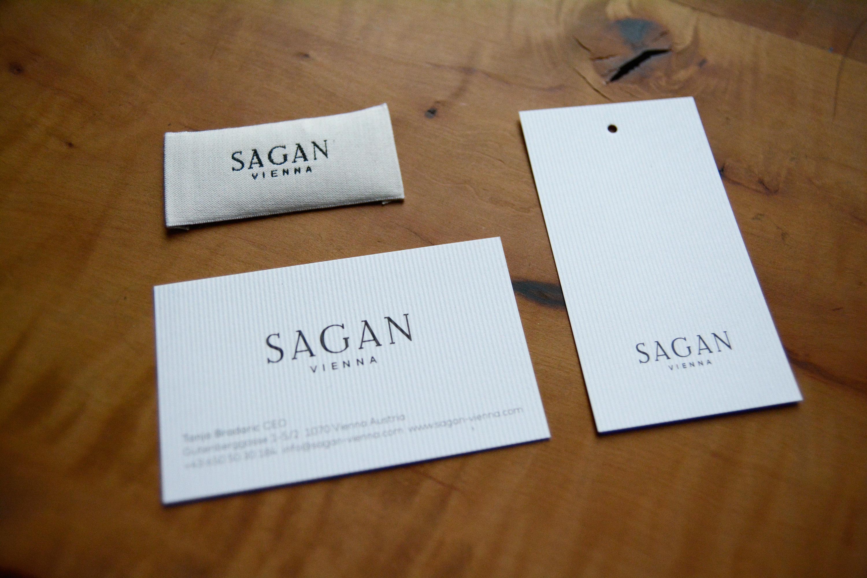 Hangtags and labels. Logo printed or stitched on each item.