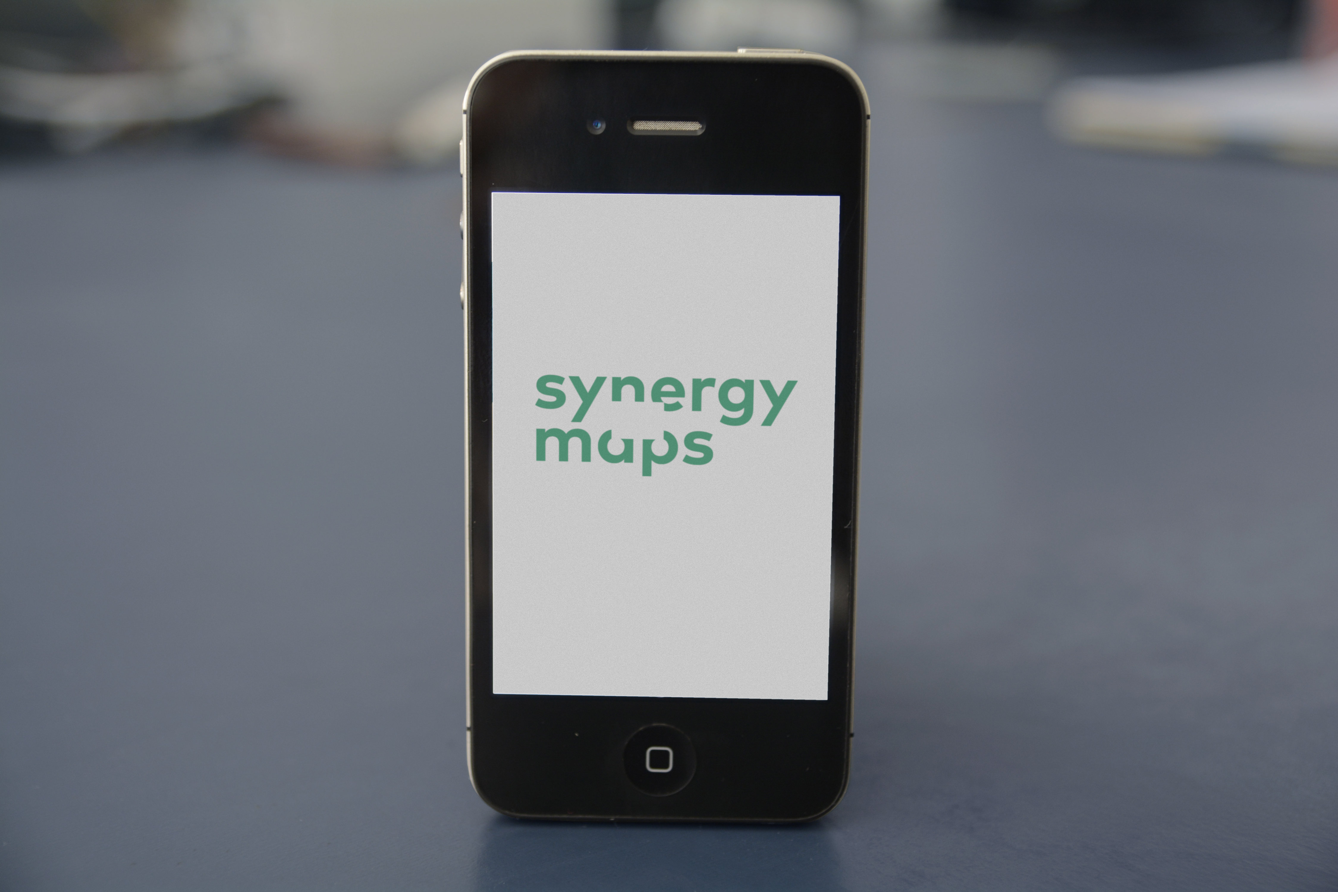 synergy maps logo displayed on smartphone.