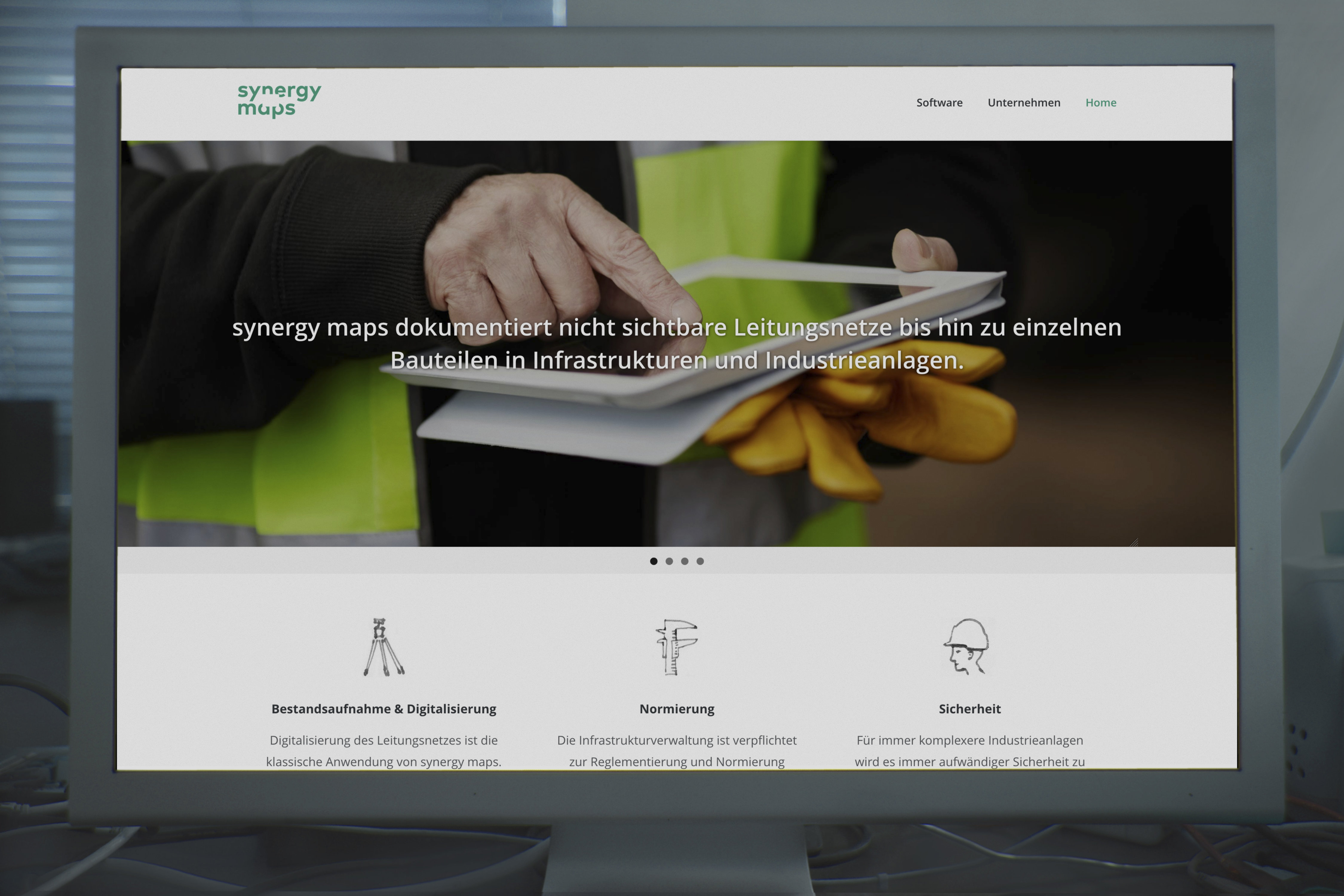 Screenshot of website displayed on desktop monitor.